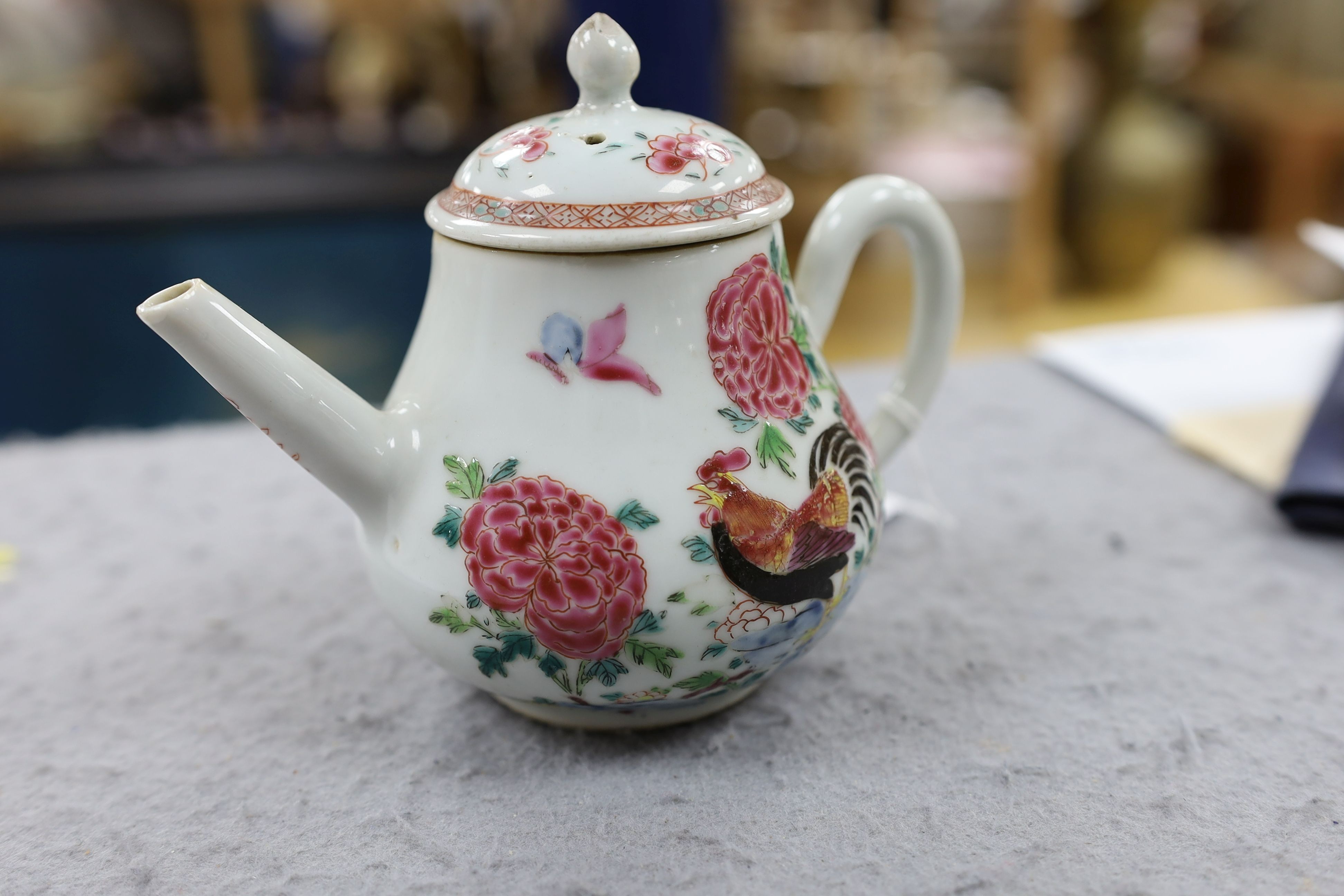 A Chinese famille rose ‘cockerel’ teapot, Yongzheng period, 12 cms high, 11.5cm high
